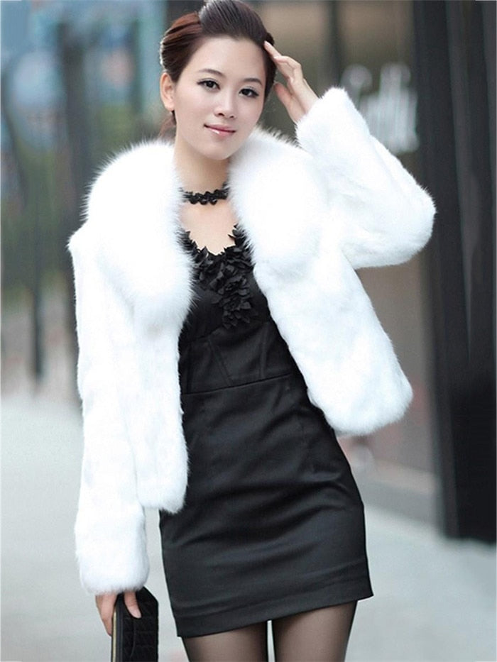 High Quality Winter Warm Fluffy Faux Fur Coat for Women featuring a faux fox fur collar, perfect for winter fashion.