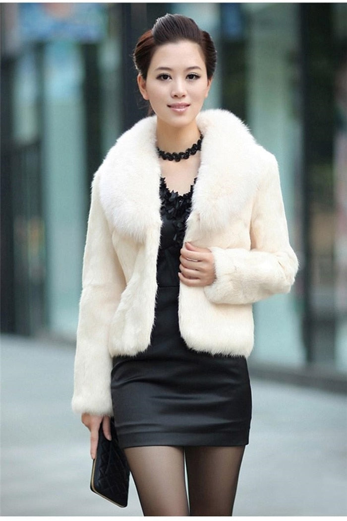 High Quality Winter Warm Fluffy Faux Fur Coat for Women featuring a faux fox fur collar, perfect for winter fashion.