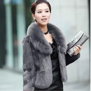 High Quality Winter Warm Fluffy Faux Fur Coat for Women featuring a faux fox fur collar, perfect for winter fashion.