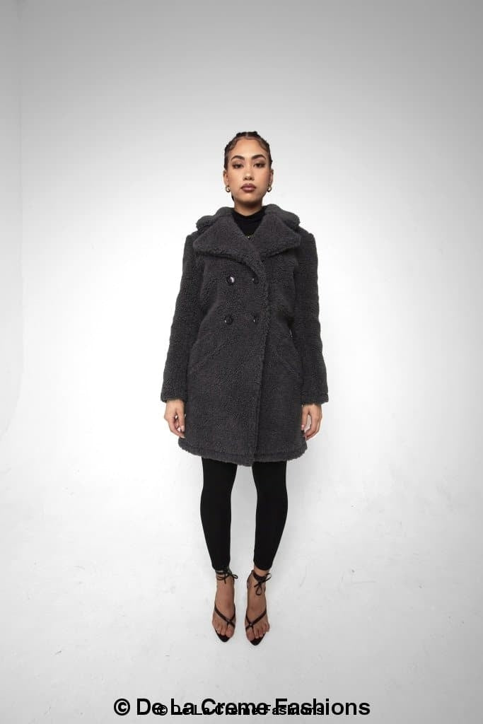 Janine Double Breasted Borg Teddy Coat in a stylish oversized design with a plush teddy finish, featuring double-breasted buttons and side pockets.