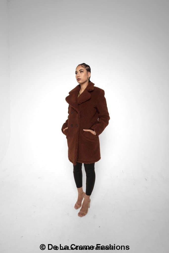 Janine Double Breasted Borg Teddy Coat in a stylish oversized design with a plush teddy finish, featuring double-breasted buttons and side pockets.