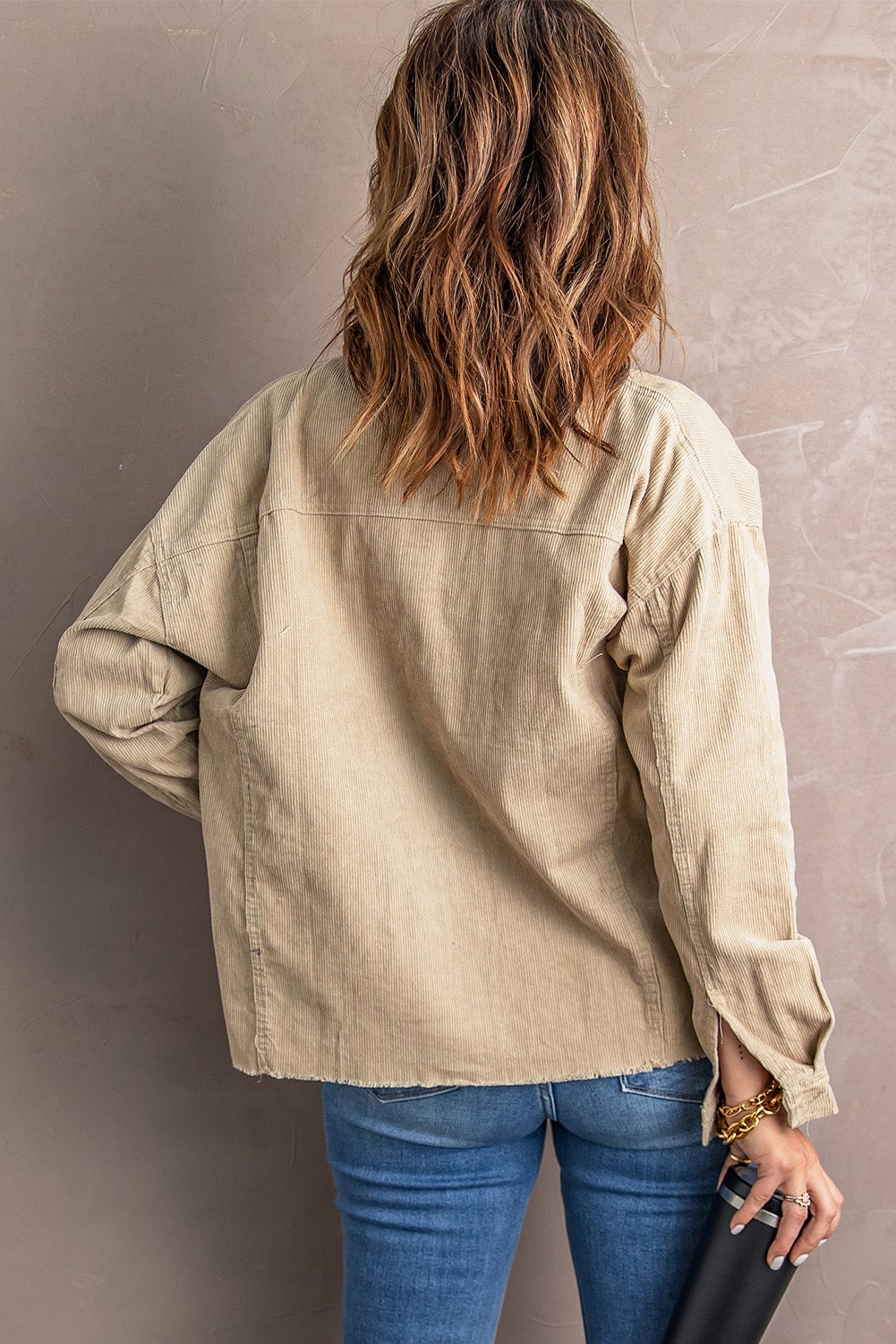 Khaki Pocket Corduroy Jacket featuring side pockets and button closure, perfect for winter layering.