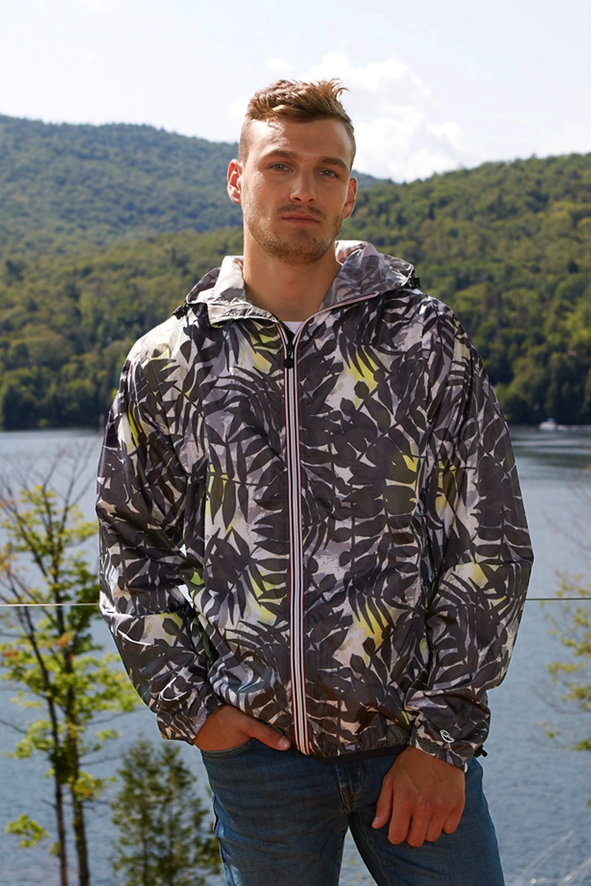 Men's palm print full zip packable rain jacket, showcasing its stylish design and practical features.