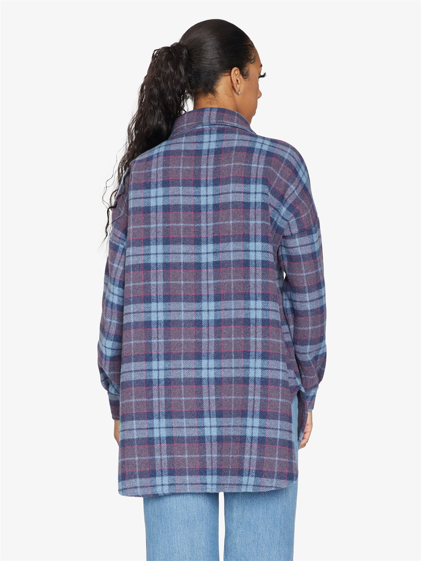 An oversized wool blend shacket featuring a luxurious nova check pattern, button down fastening, and a stylish design suitable for various occasions.