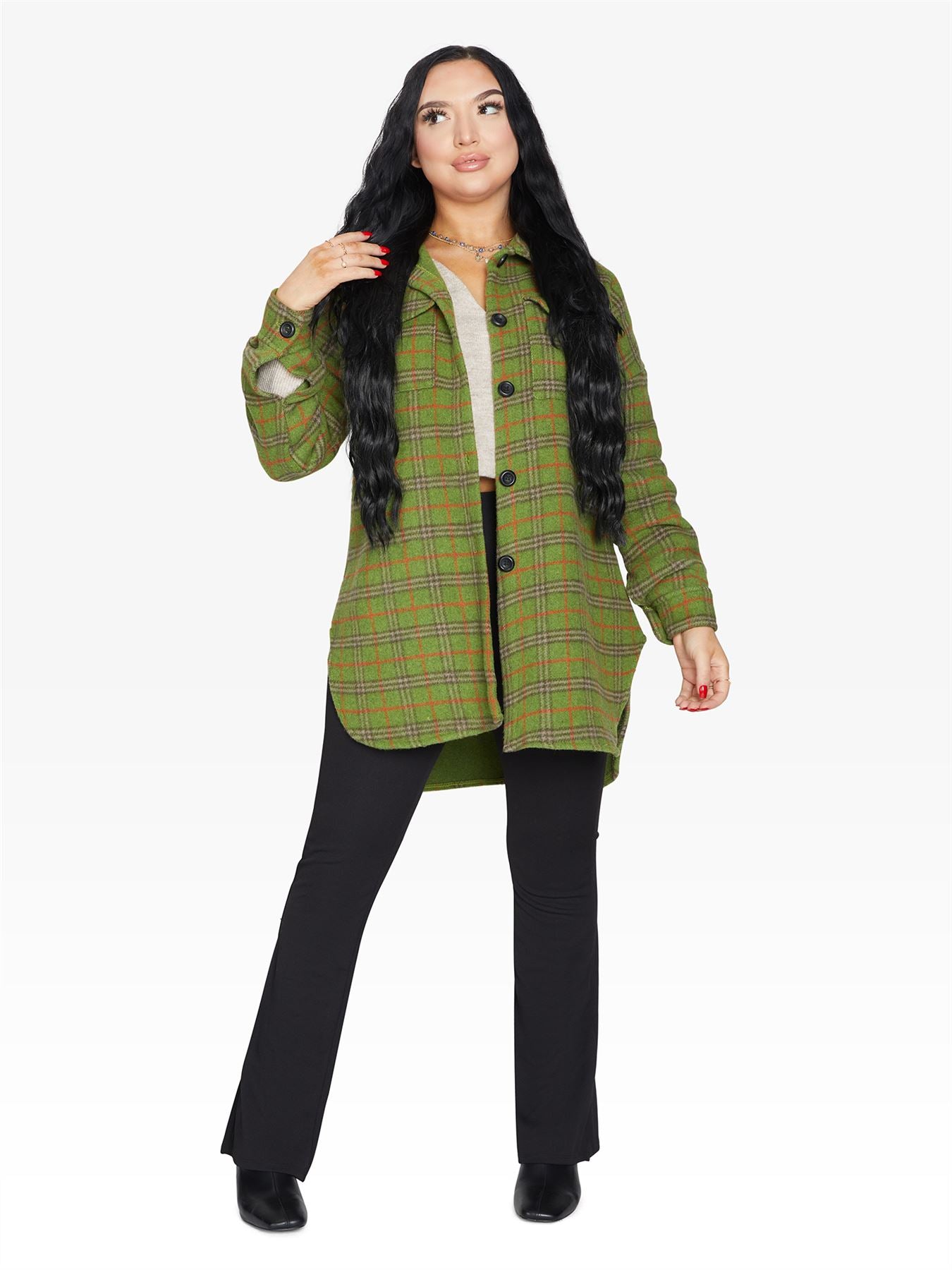 An oversized wool blend shacket featuring a luxurious nova check pattern, button down fastening, and a stylish design suitable for various occasions.