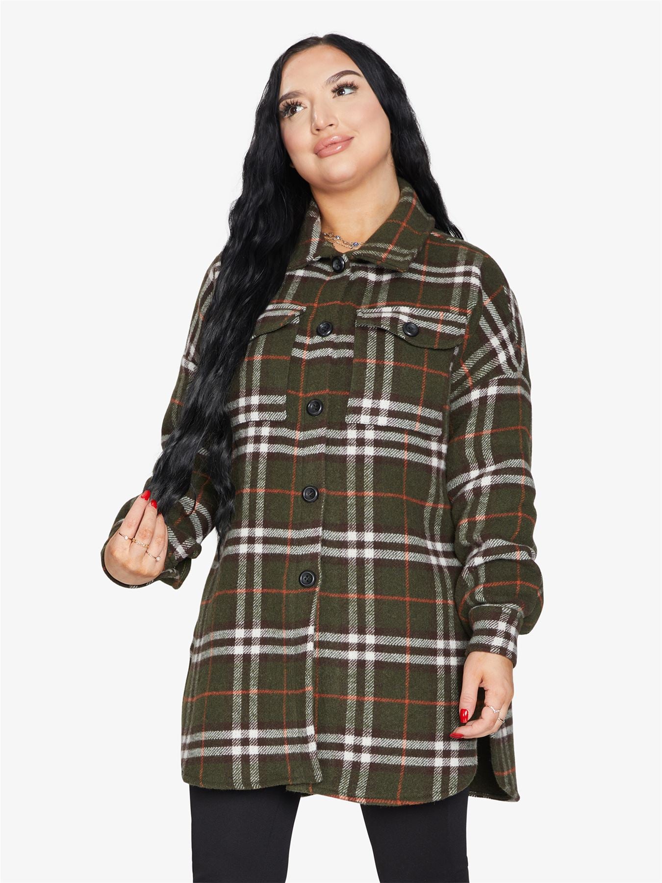 An oversized wool blend shacket featuring a luxurious nova check pattern, button down fastening, and a stylish design suitable for various occasions.