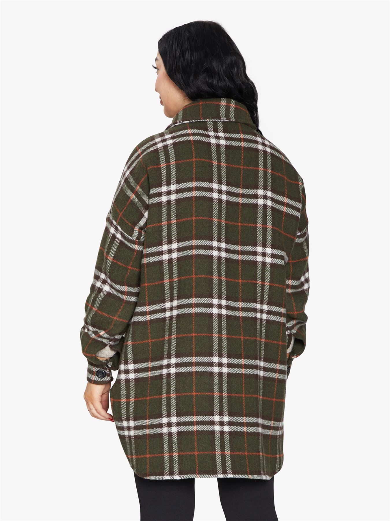 An oversized wool blend shacket featuring a luxurious nova check pattern, button down fastening, and a stylish design suitable for various occasions.