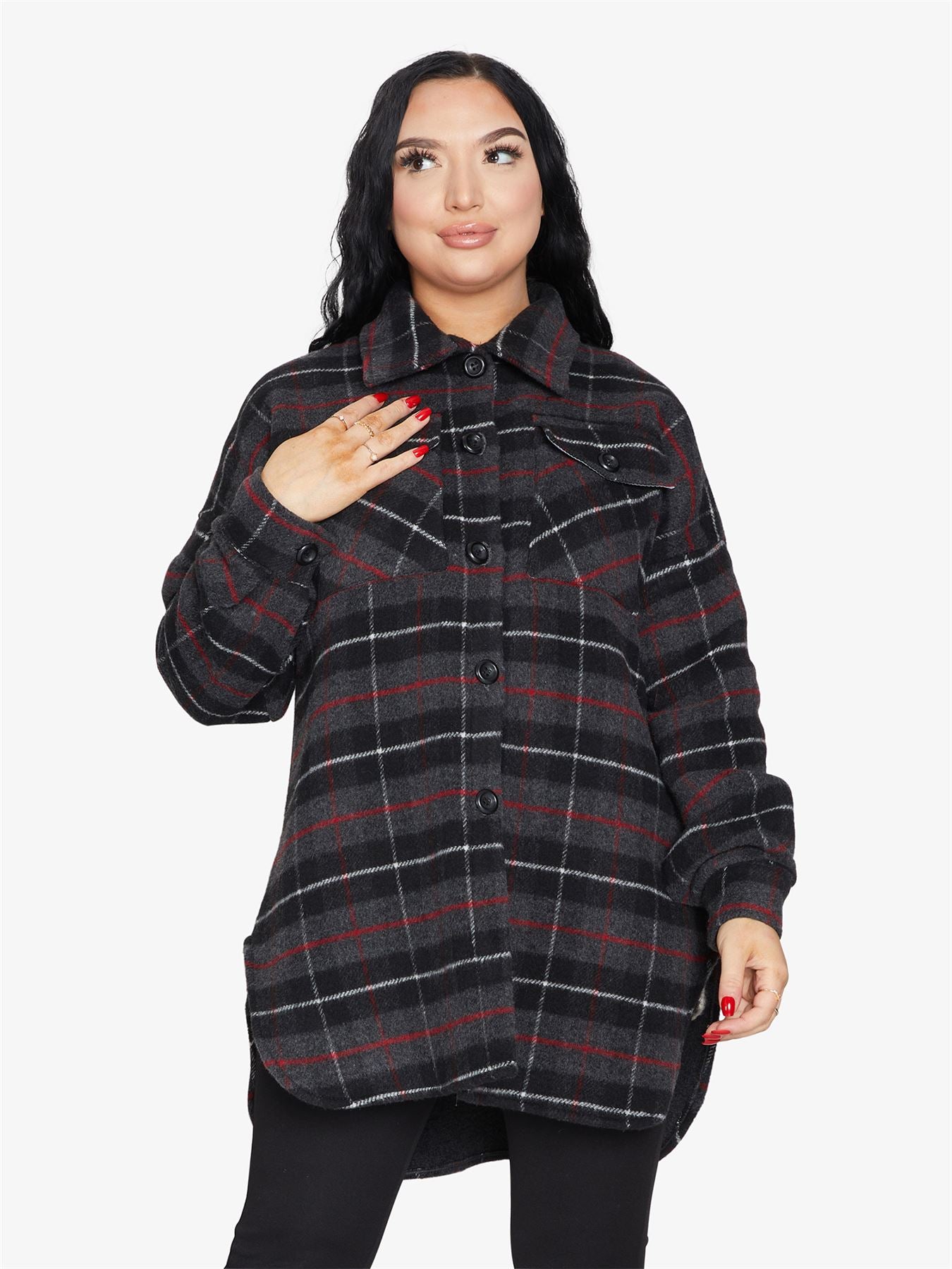 An oversized wool blend shacket featuring a luxurious nova check pattern, button down fastening, and a stylish design suitable for various occasions.