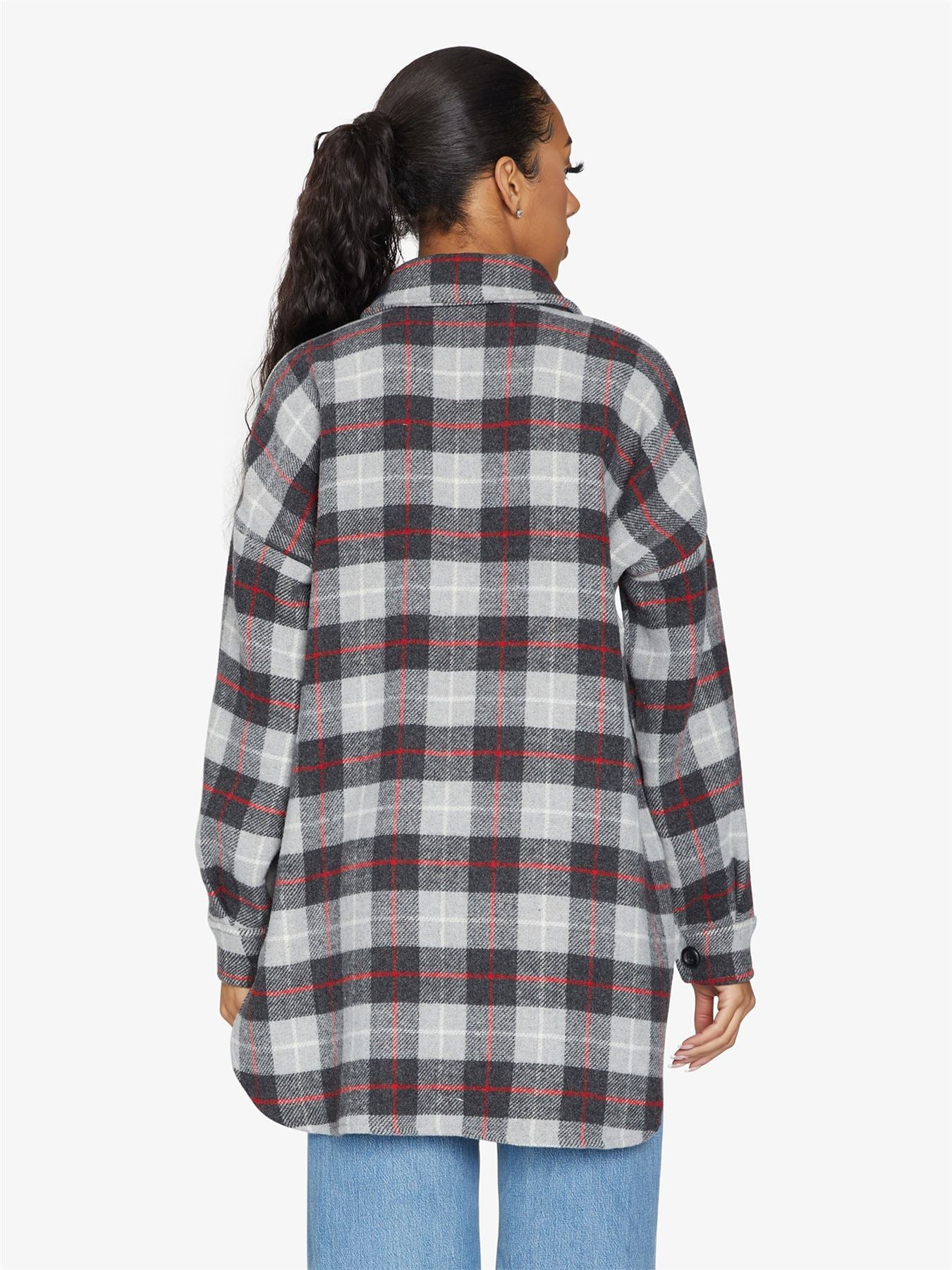 An oversized wool blend shacket featuring a luxurious nova check pattern, button down fastening, and a stylish design suitable for various occasions.