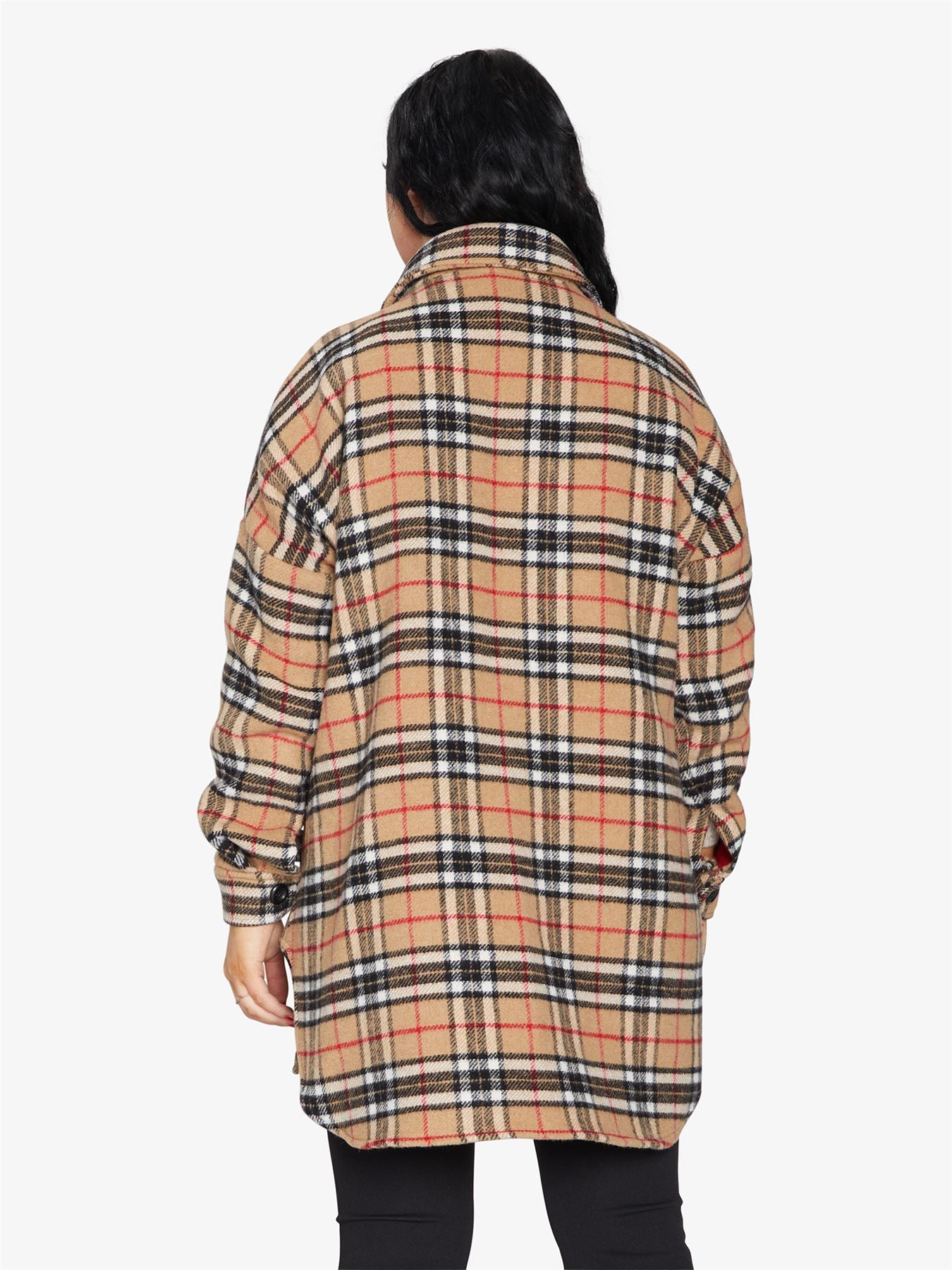 An oversized wool blend shacket featuring a luxurious nova check pattern, button down fastening, and a stylish design suitable for various occasions.