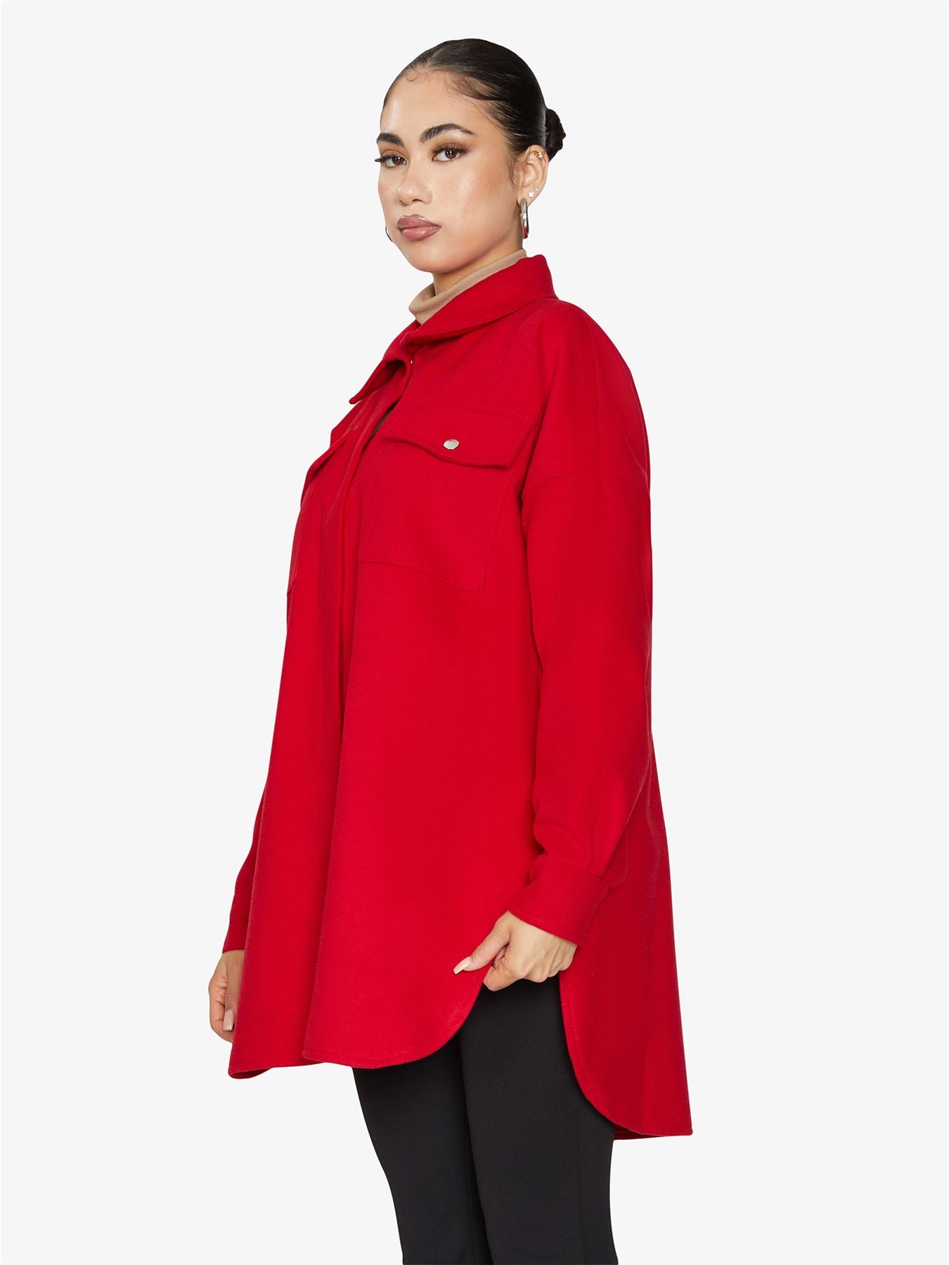 Oversized shacket with stud button fastening and front chest pockets, showcasing a stylish design.