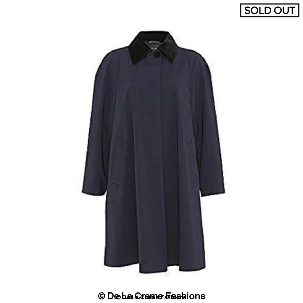 Oversized lightweight swing coat with velvet trim collar, featuring concealed button fastening and fully lined interior, available in various sizes.