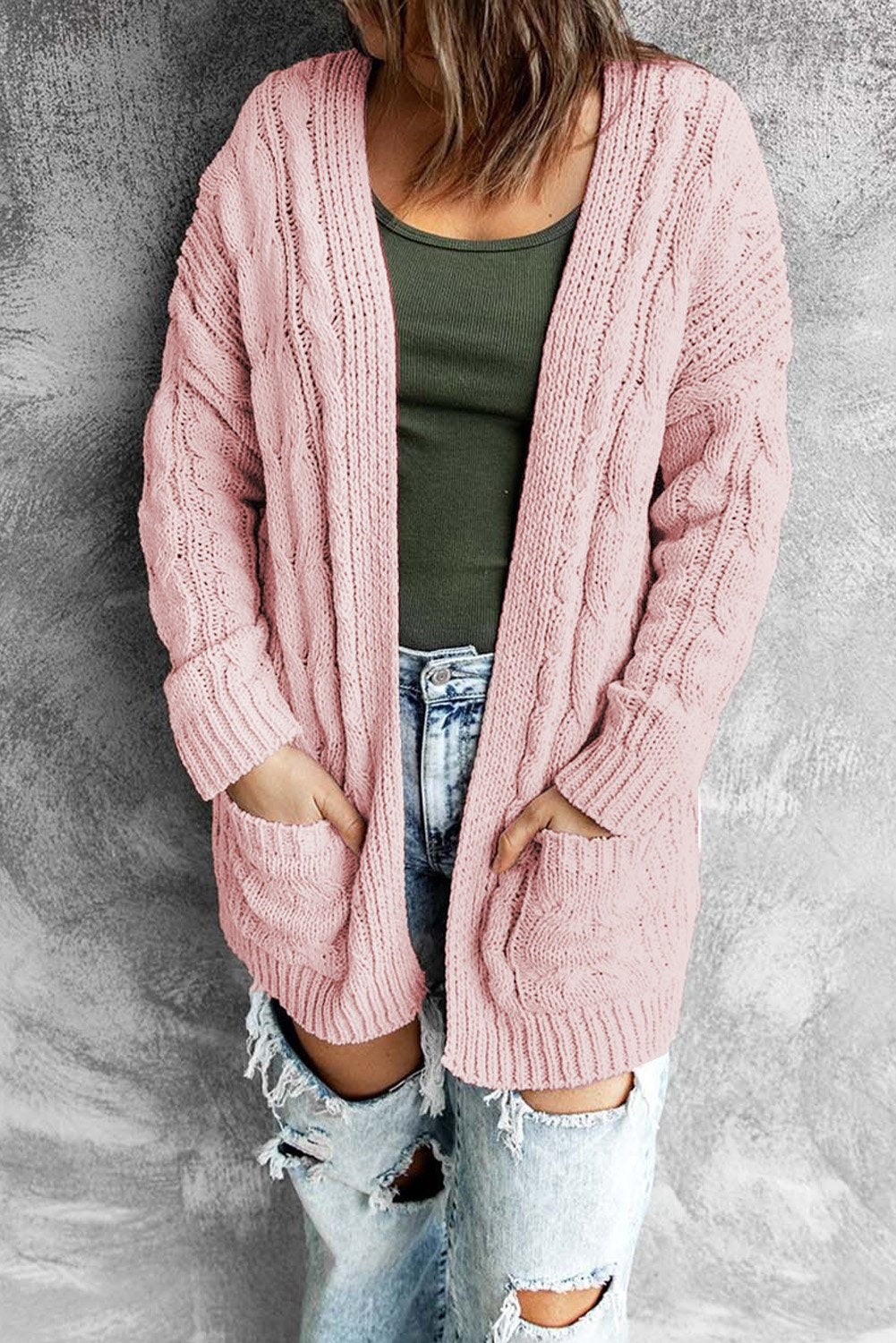 A stylish pink open front cardigan with long sleeves and pockets, perfect for winter wear.