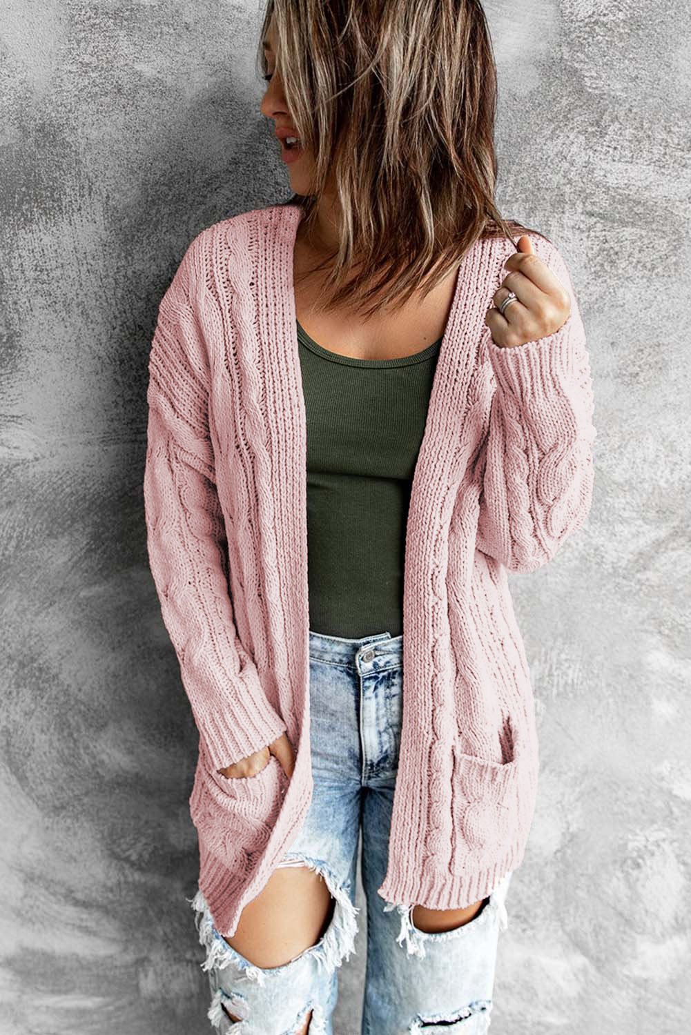 A stylish pink open front cardigan with long sleeves and pockets, perfect for winter wear.