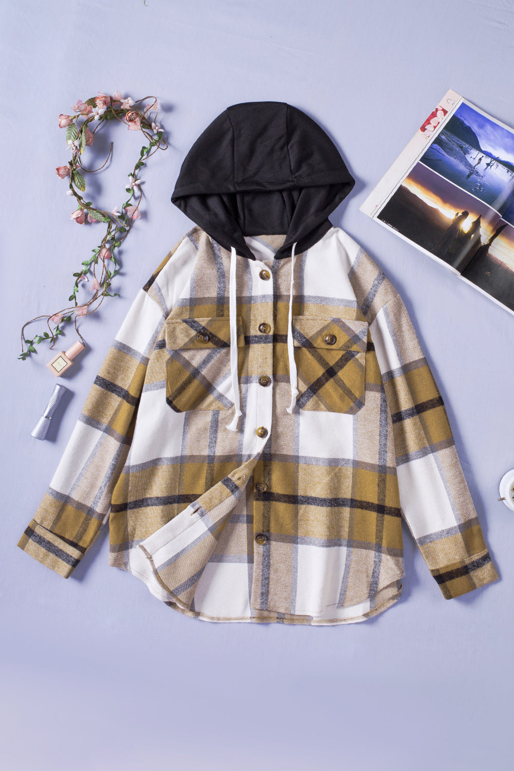 A stylish plaid hooded shirt jacket featuring long sleeves, button closure, and flap pockets, perfect for casual wear.