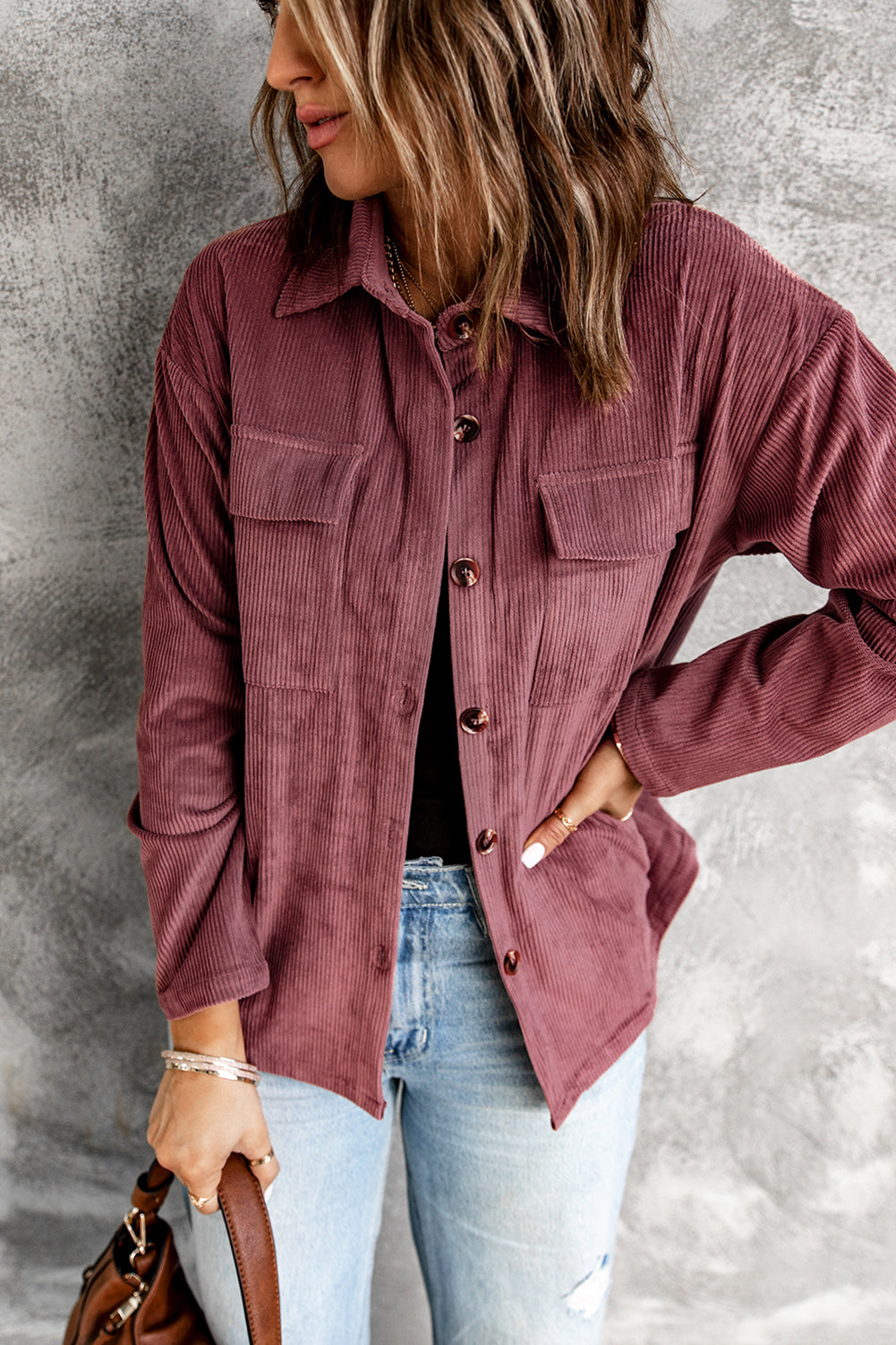 A stylish Pocketed Button Corduroy Shacket featuring a turn-down collar, button closures, and functional pockets, perfect for casual wear.