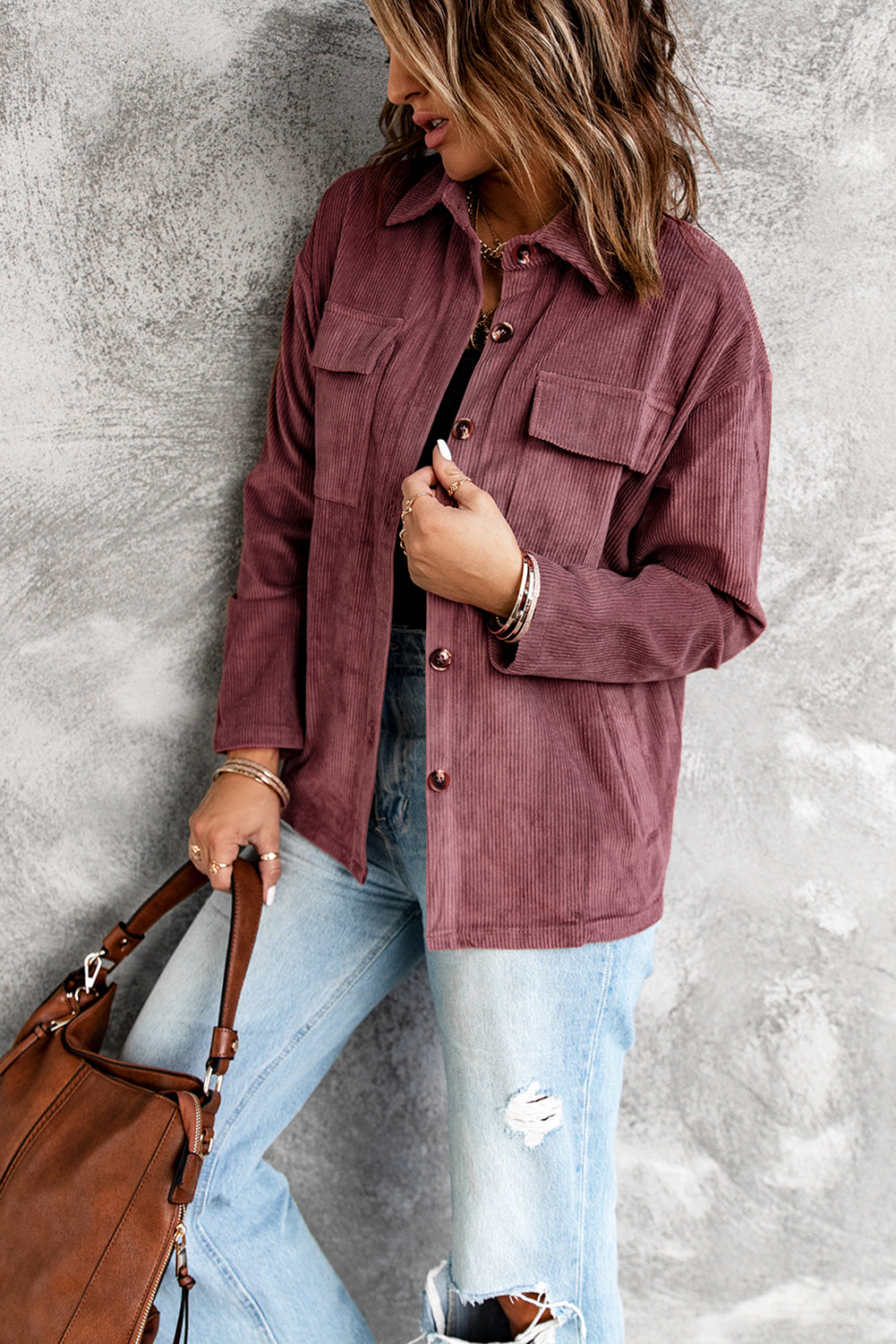 A stylish Pocketed Button Corduroy Shacket featuring a turn-down collar, button closures, and functional pockets, perfect for casual wear.