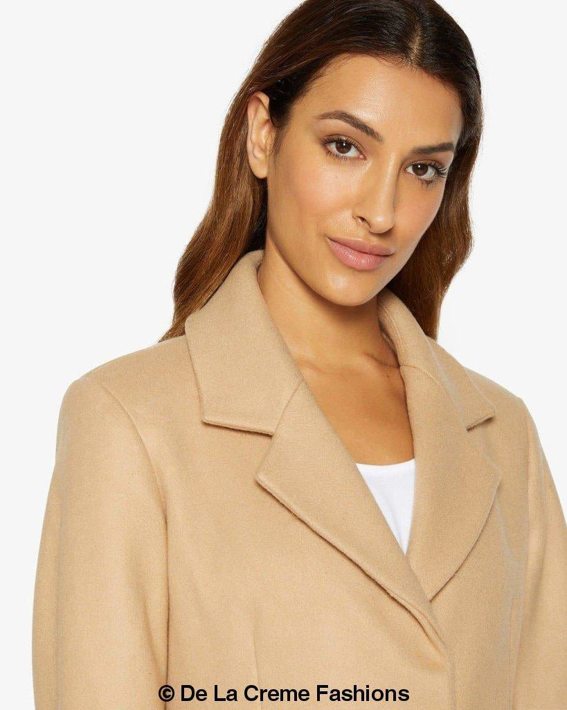 Sara Covert Button Up Coat featuring a lapel collar, concealed button fastening, and two side slit pockets, designed for a slim fit.