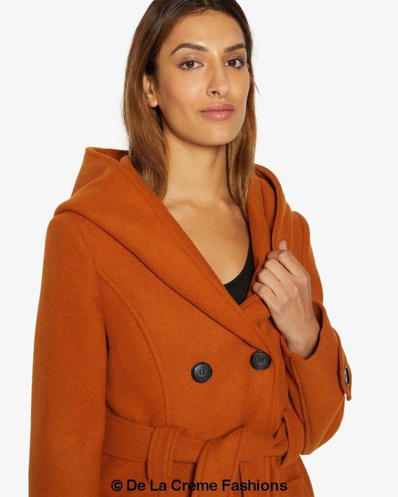 A stylish slim fit shawl hooded coat in luxurious faux wool blend, featuring a double-breasted front and a large hood.