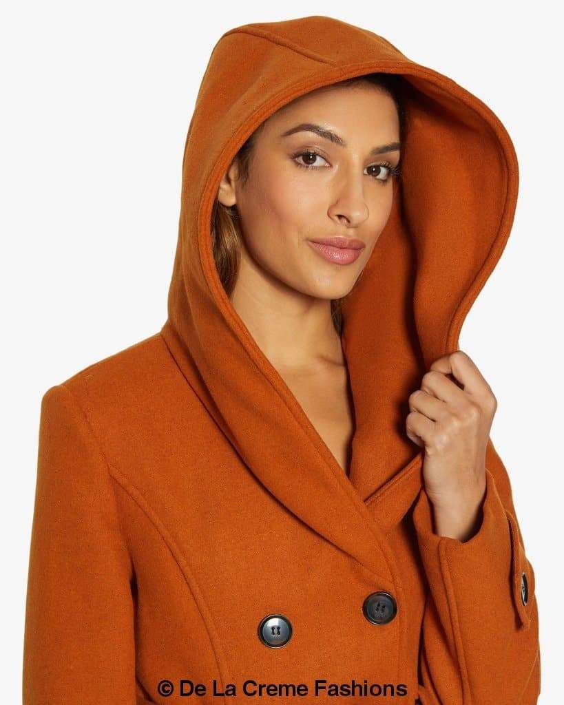 A stylish slim fit shawl hooded coat in luxurious faux wool blend, featuring a double-breasted front and a large hood.