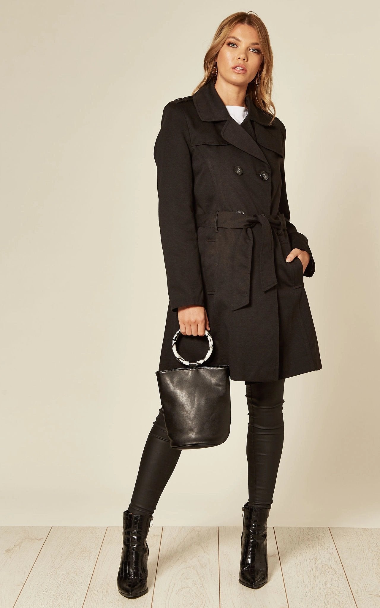 Women's Spring/Summer Military Double Breasted Trench Coat featuring epaulettes and side pockets, hip length design.