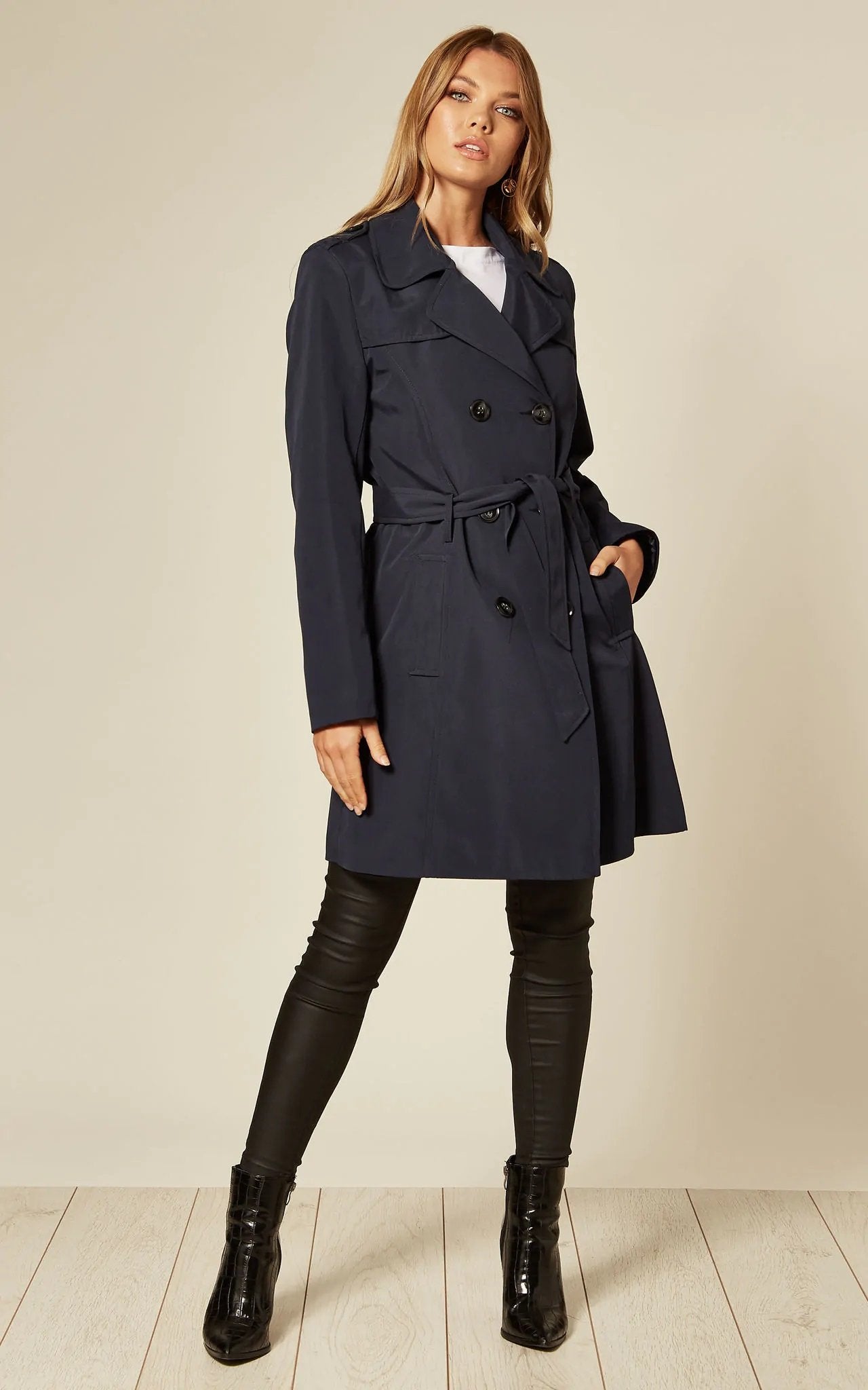 Women's Spring/Summer Military Double Breasted Trench Coat featuring epaulettes and side pockets, hip length design.