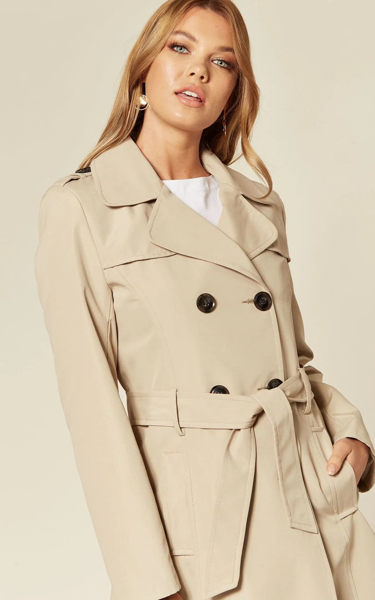 Women's Spring/Summer Military Double Breasted Trench Coat featuring epaulettes and side pockets, hip length design.