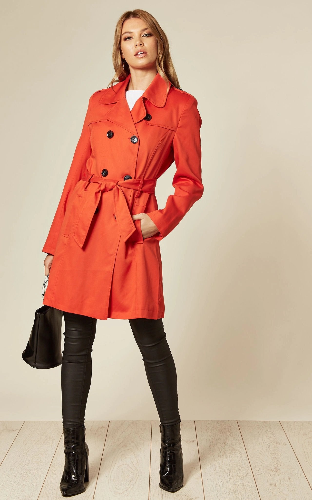 Women's Spring/Summer Military Double Breasted Trench Coat featuring epaulettes and side pockets, hip length design.