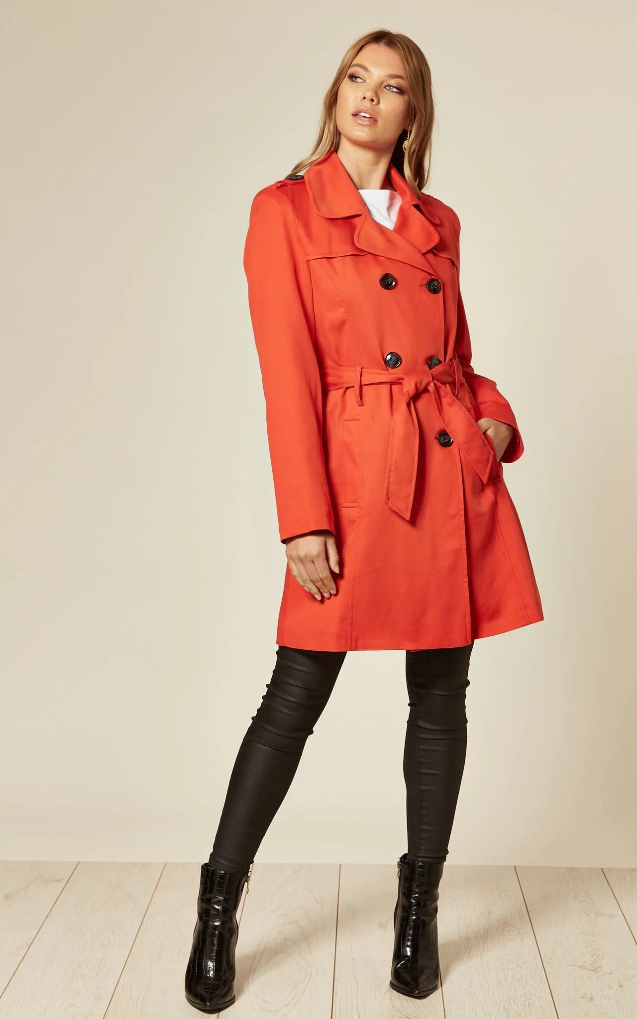 Women's Spring/Summer Military Double Breasted Trench Coat featuring epaulettes and side pockets, hip length design.