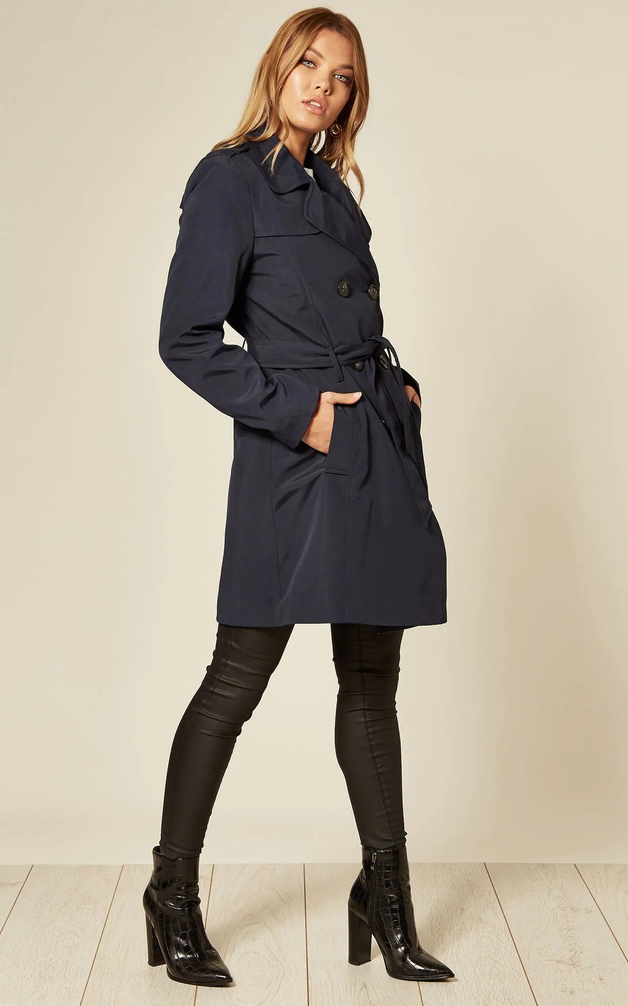 Women's Spring/Summer Military Double Breasted Trench Coat featuring epaulettes and side pockets, hip length design.