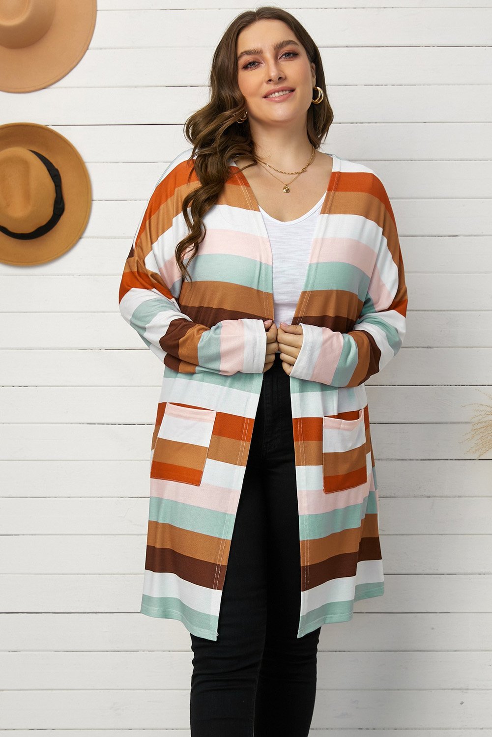 A stylish brown stripe plus size cardigan with full sleeves and pockets, perfect for layering in spring and autumn.