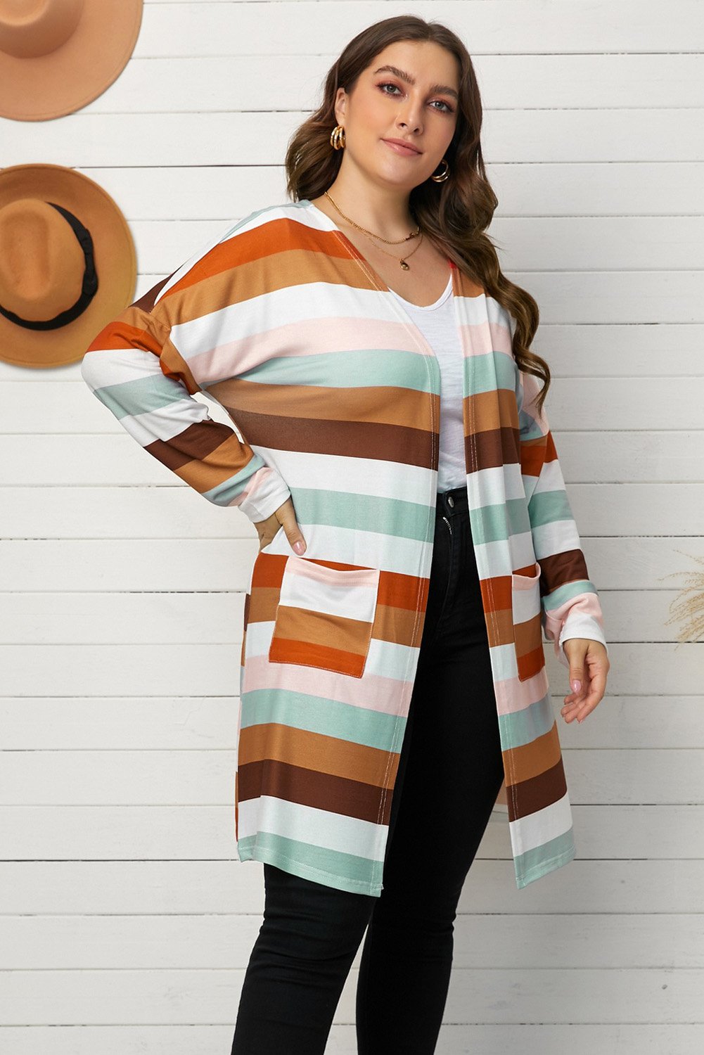 A stylish brown stripe plus size cardigan with full sleeves and pockets, perfect for layering in spring and autumn.