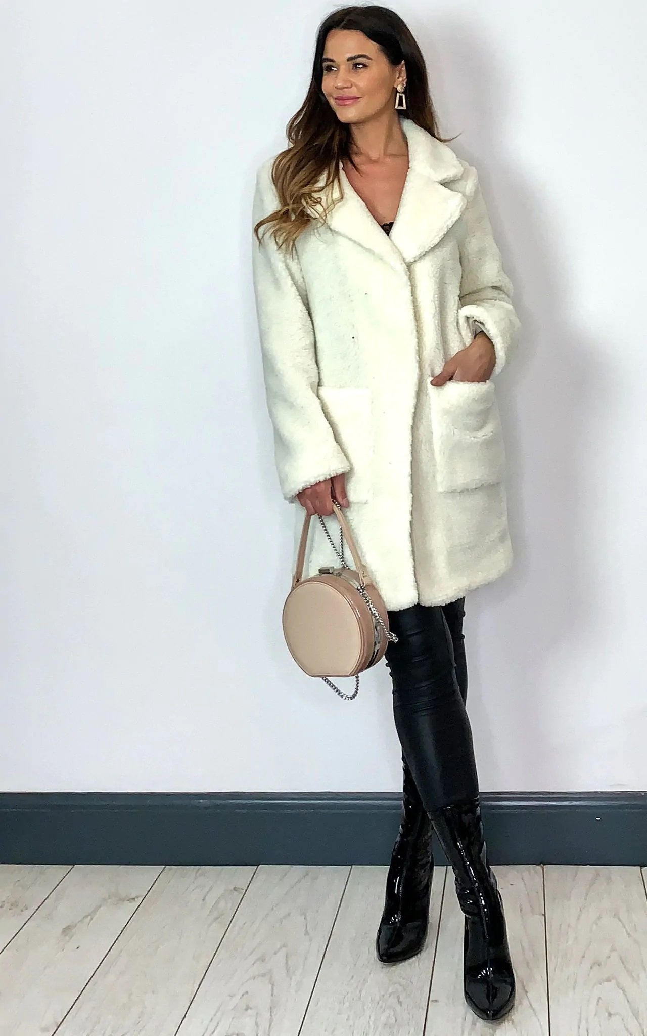 Oversized hip-length Stud Button Borg Teddy Coat with plush teddy finish, featuring popper button fastening and side pockets.