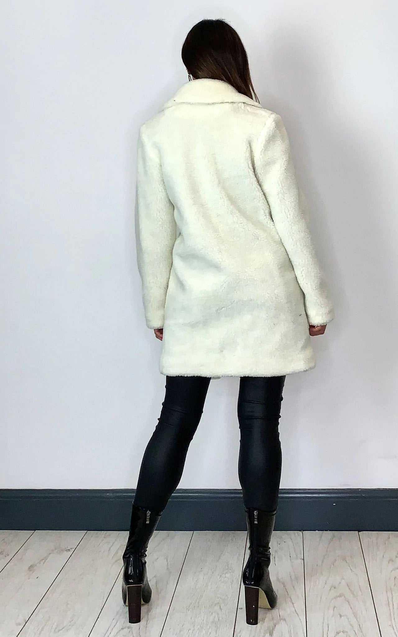 Oversized hip-length Stud Button Borg Teddy Coat with plush teddy finish, featuring popper button fastening and side pockets.