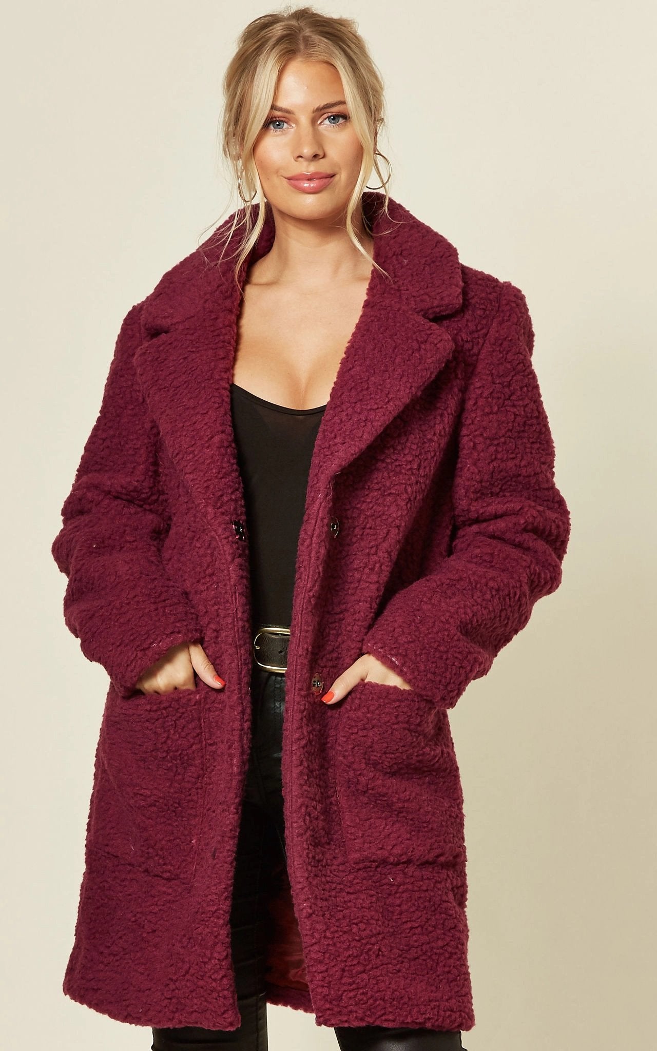 Oversized hip-length Stud Button Borg Teddy Coat with plush teddy finish, featuring popper button fastening and side pockets.