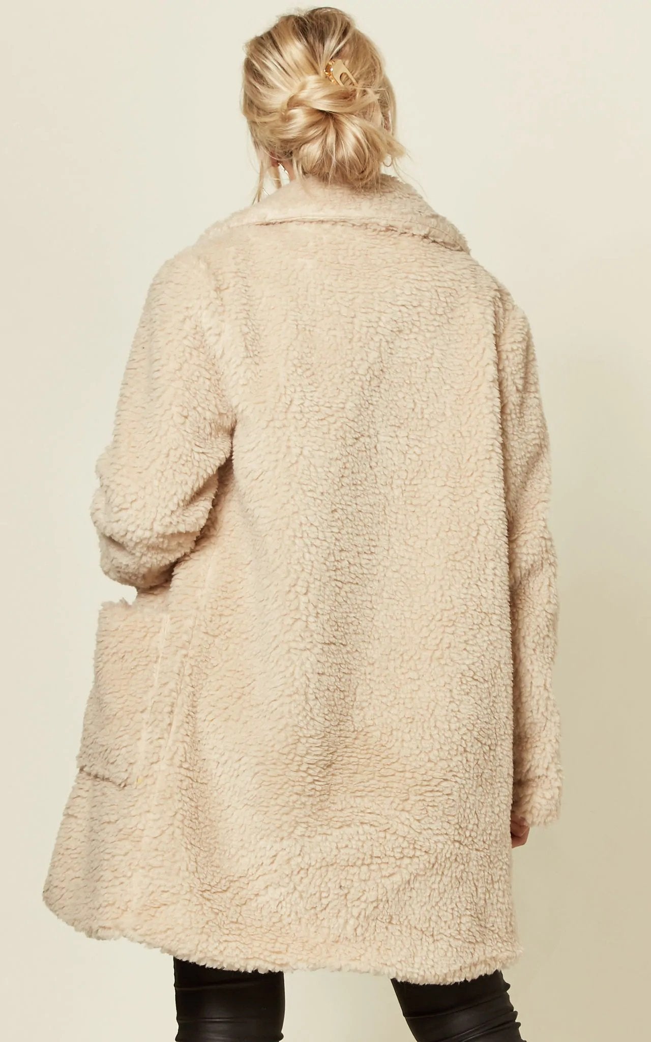 Oversized hip-length Stud Button Borg Teddy Coat with plush teddy finish, featuring popper button fastening and side pockets.