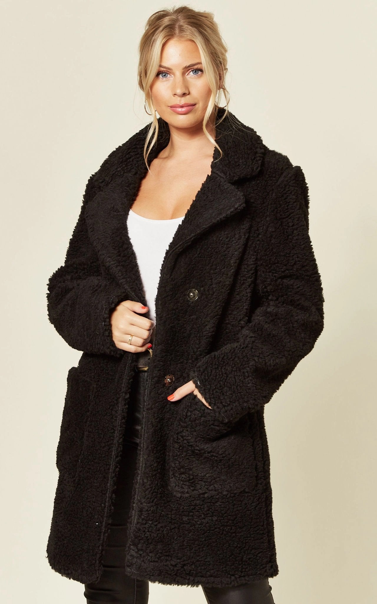 Oversized hip-length Stud Button Borg Teddy Coat with plush teddy finish, featuring popper button fastening and side pockets.