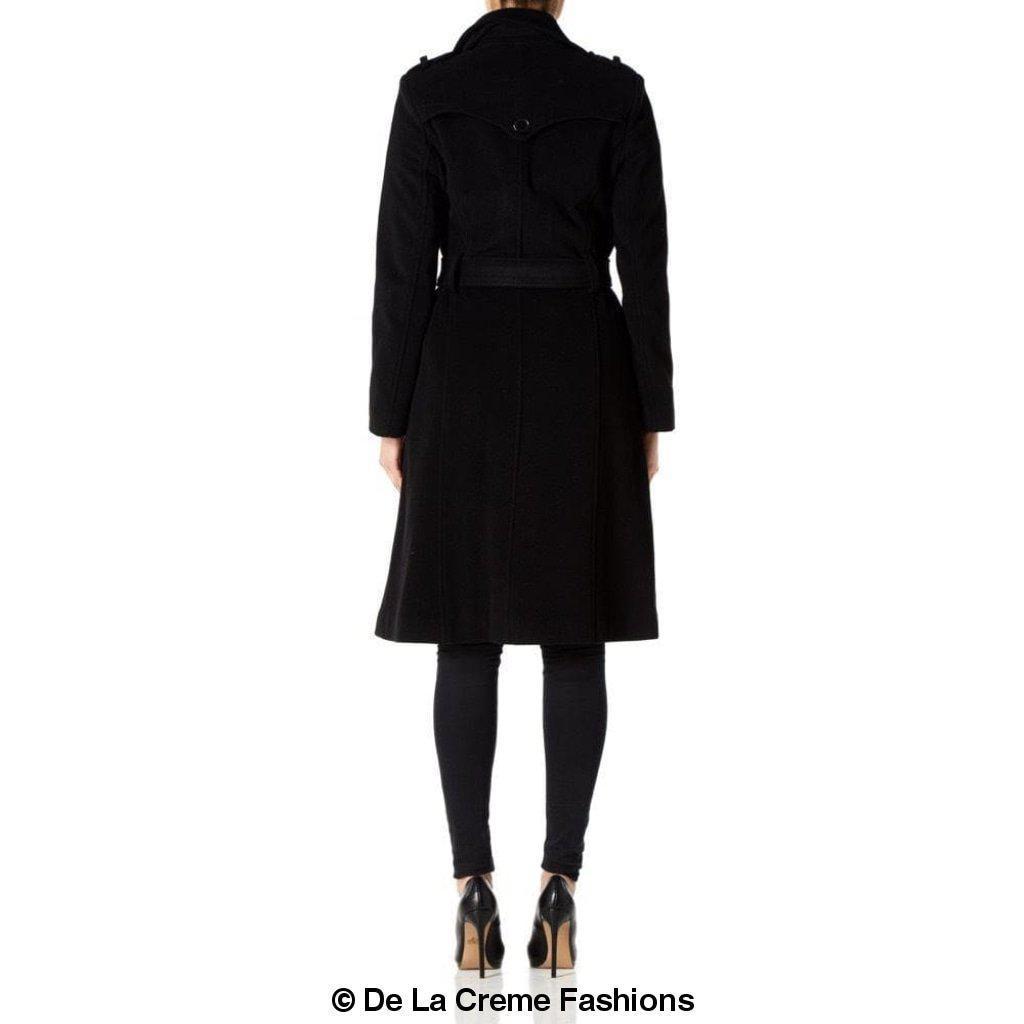 A stylish women's military coat made from a luxurious wool and cashmere blend, featuring double-breasted fastening, military epaulettes, and knee-length design.