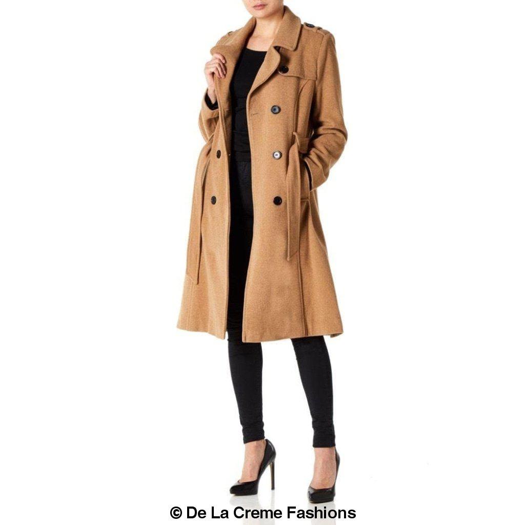 A stylish women's military coat made from a luxurious wool and cashmere blend, featuring double-breasted fastening, military epaulettes, and knee-length design.