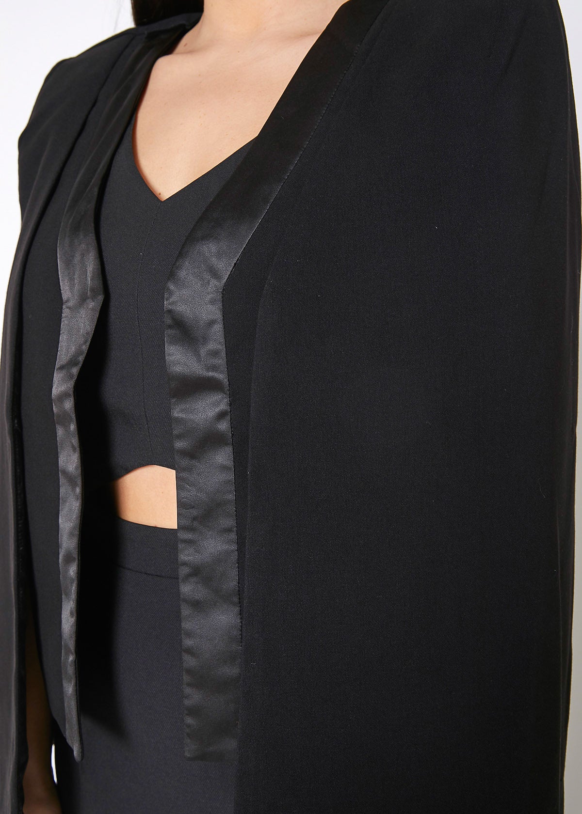 Women's Black Satin Trim Cape Blazer featuring an open front design and elegant satin trim hem, perfect for professional attire.