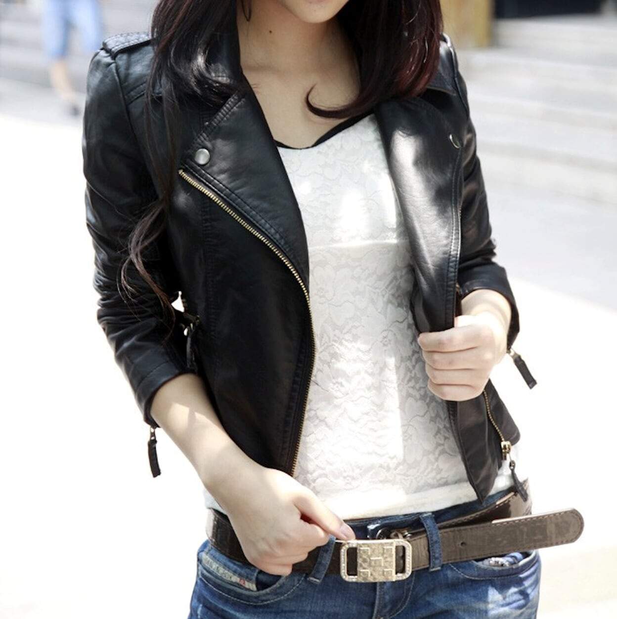 Womens Cropped Vegan Leather Jacket in black, showcasing its stylish cropped design and slim fit.