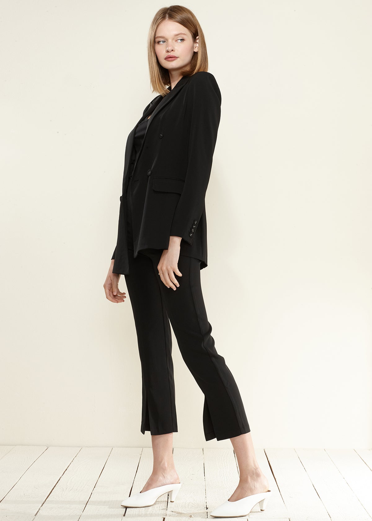 A stylish Women's Double Breasted Blazer in a sophisticated cut, showcasing its elegant design and quality fabric.