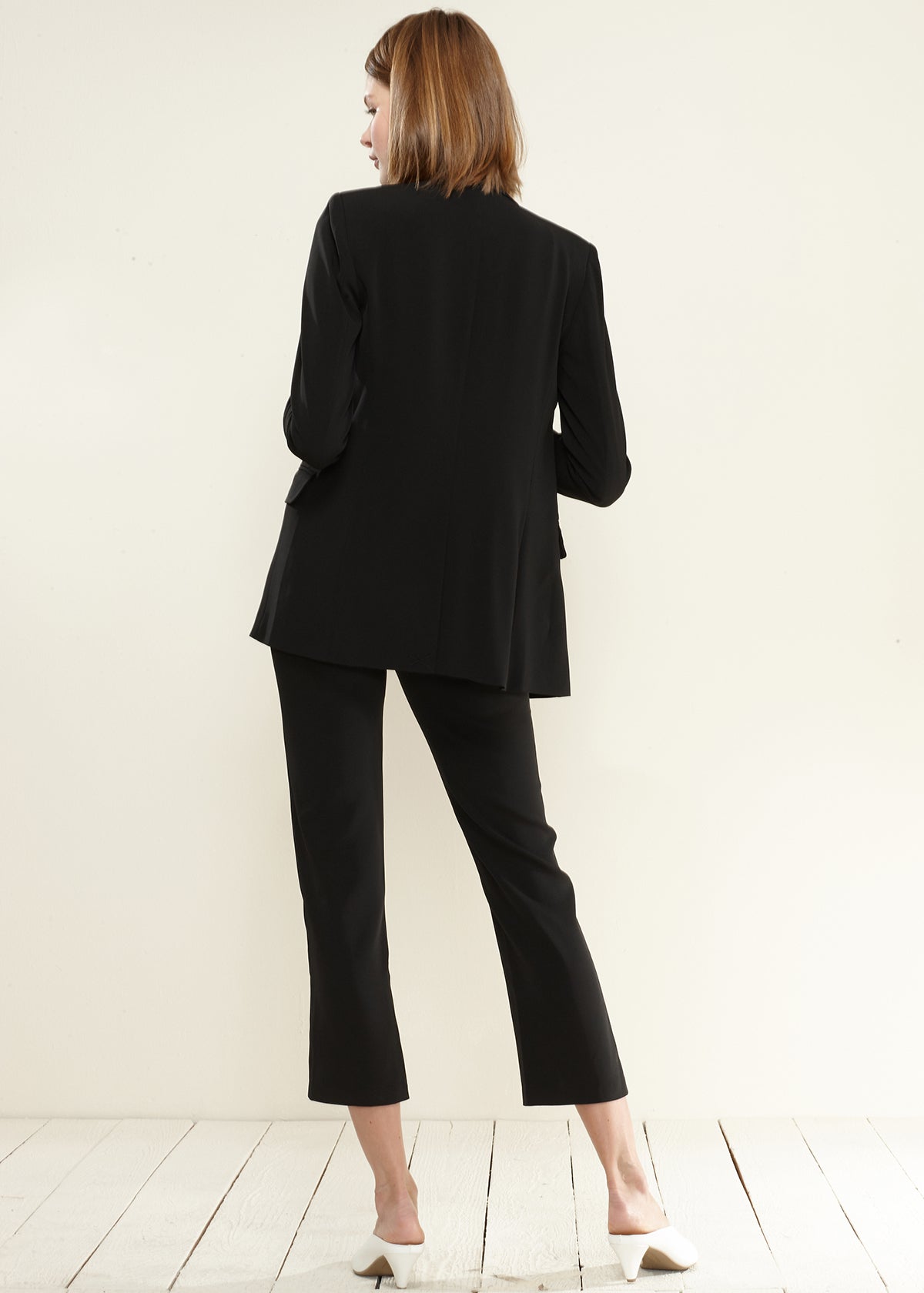 A stylish Women's Double Breasted Blazer in a sophisticated cut, showcasing its elegant design and quality fabric.