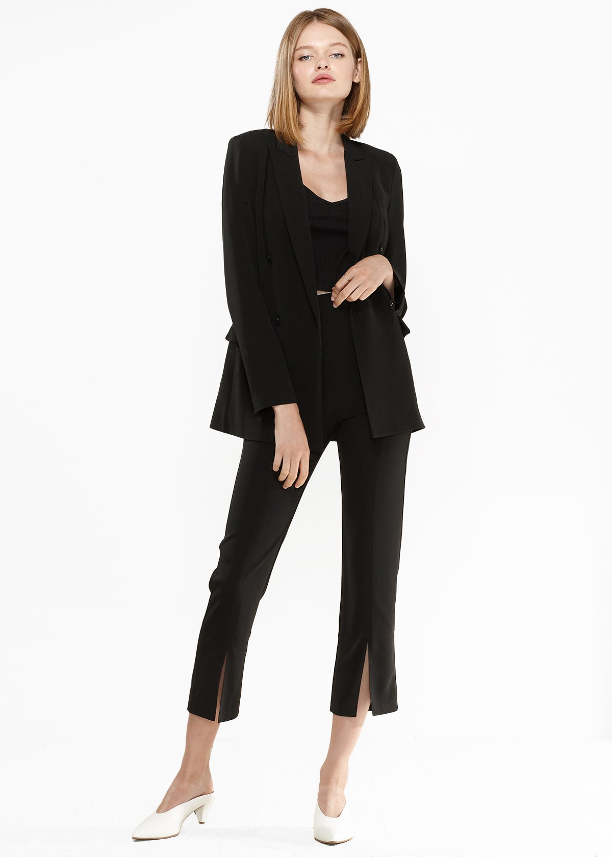 A stylish Women's Double Breasted Blazer in a sophisticated cut, showcasing its elegant design and quality fabric.