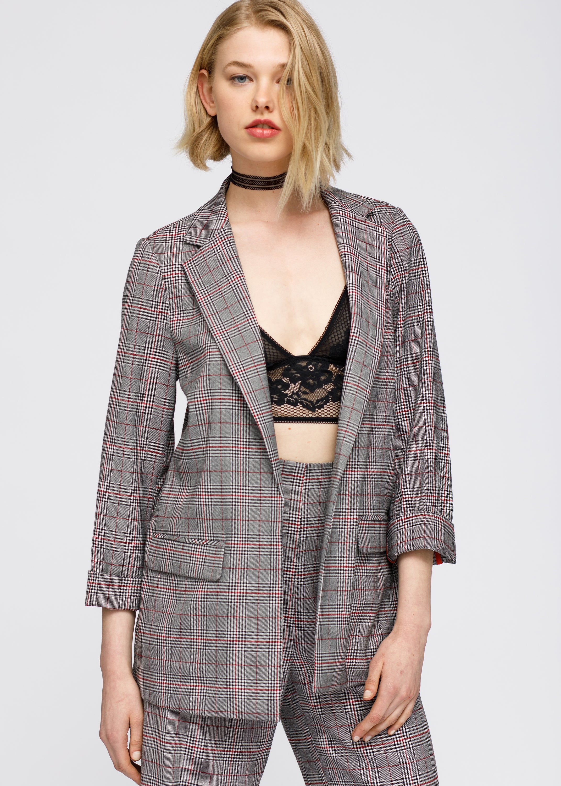 Women's Multi Glen Plaid Blazer in Grey Plaid featuring a notched collar and front flap pockets, showcasing a stylish multi glen plaid pattern.