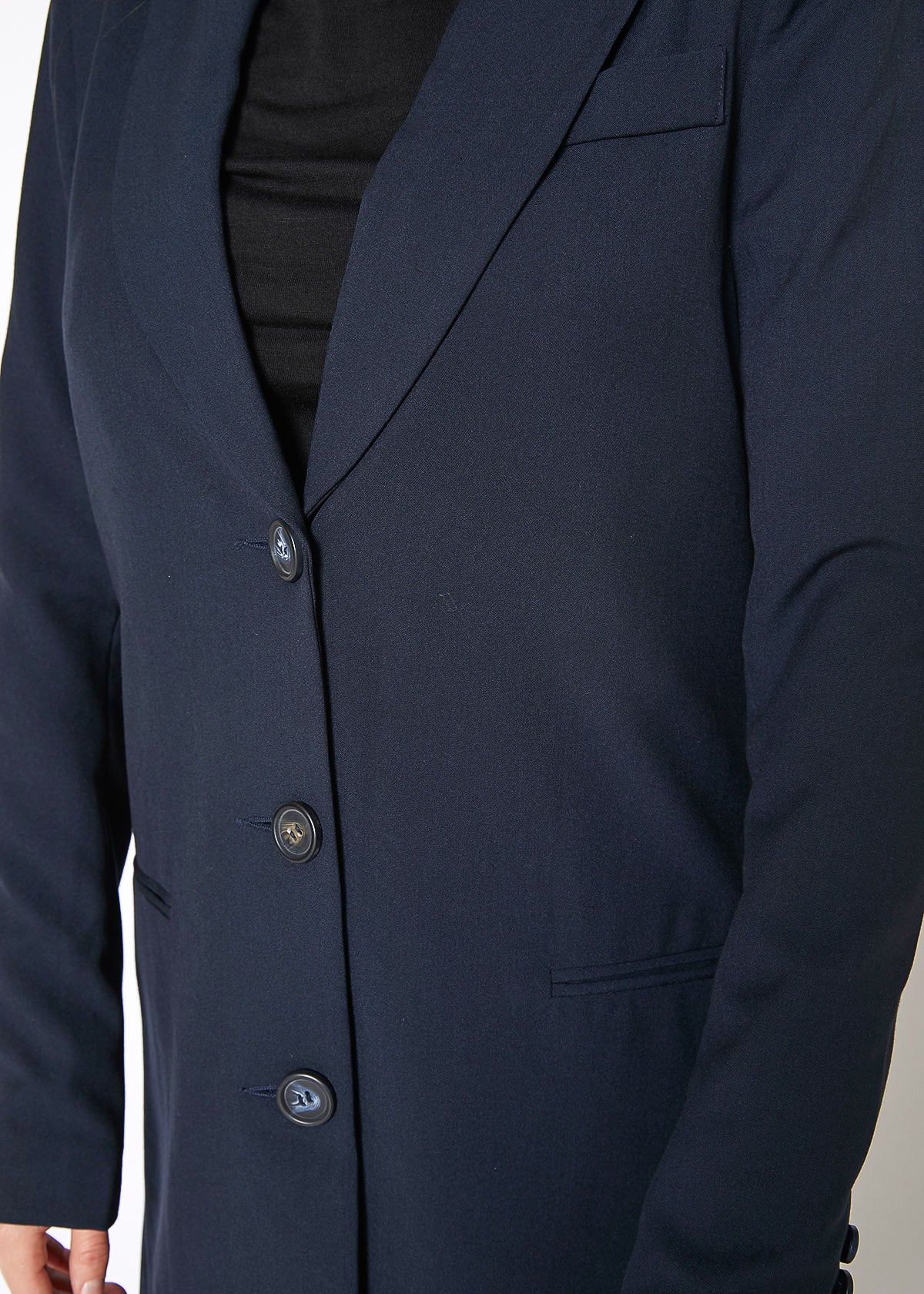 Women's Notch Lapel Longline Button Front Jacket featuring a stylish notch lapel, faux pocket hems, and large button closure, perfect for professional wear.