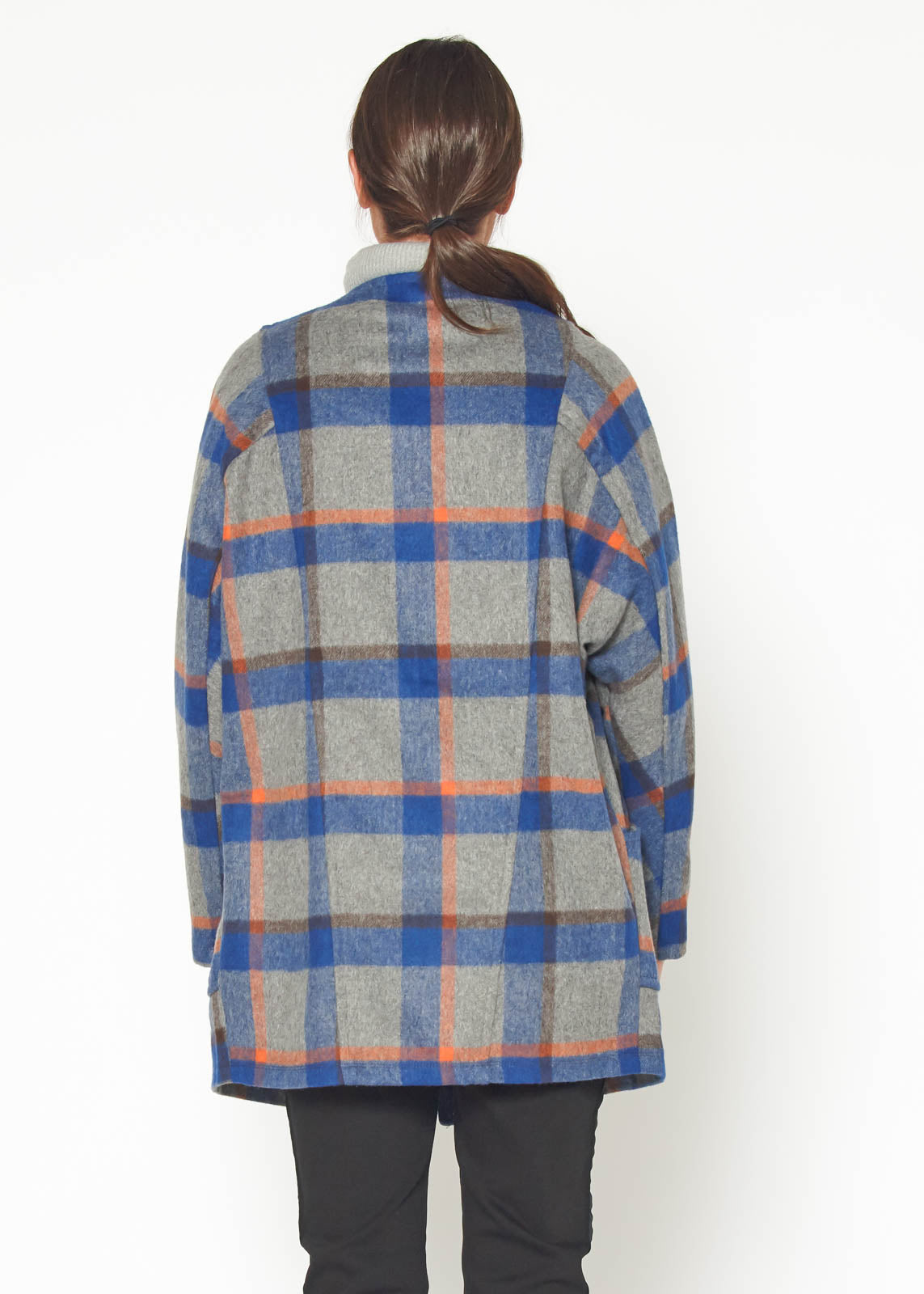 A stylish Women's Wool Blended Oversized Coat displayed on a mannequin, showcasing its cozy fabric and oversized fit.