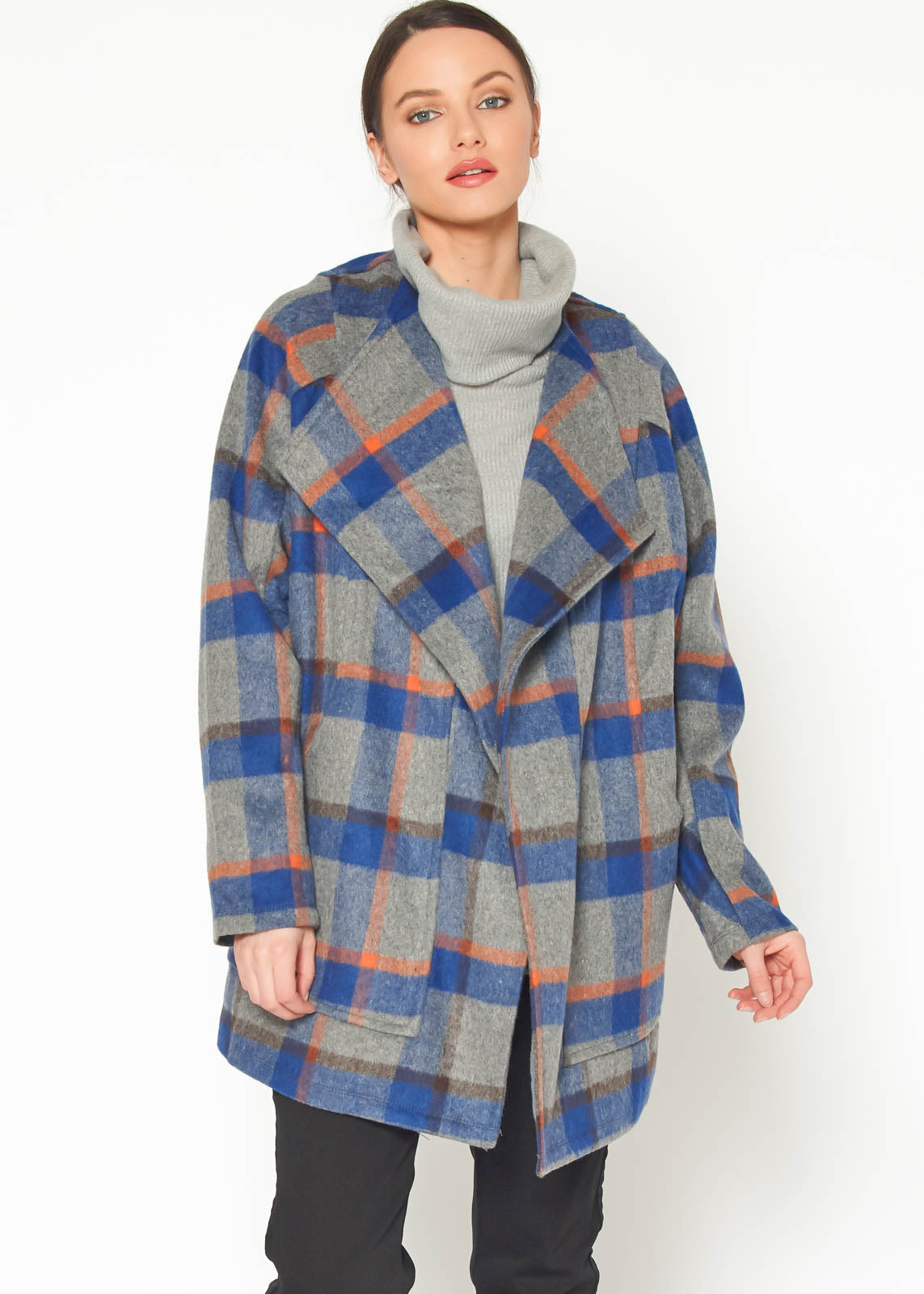 A stylish Women's Wool Blended Oversized Coat displayed on a mannequin, showcasing its cozy fabric and oversized fit.