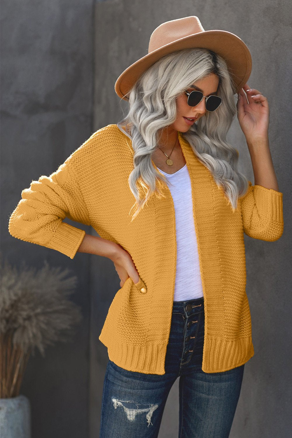 A stylish Women's Yellow Open Front Chunky Knit Cardigan featuring a slouchy fit and braided texture on sleeves, perfect for winter wear.