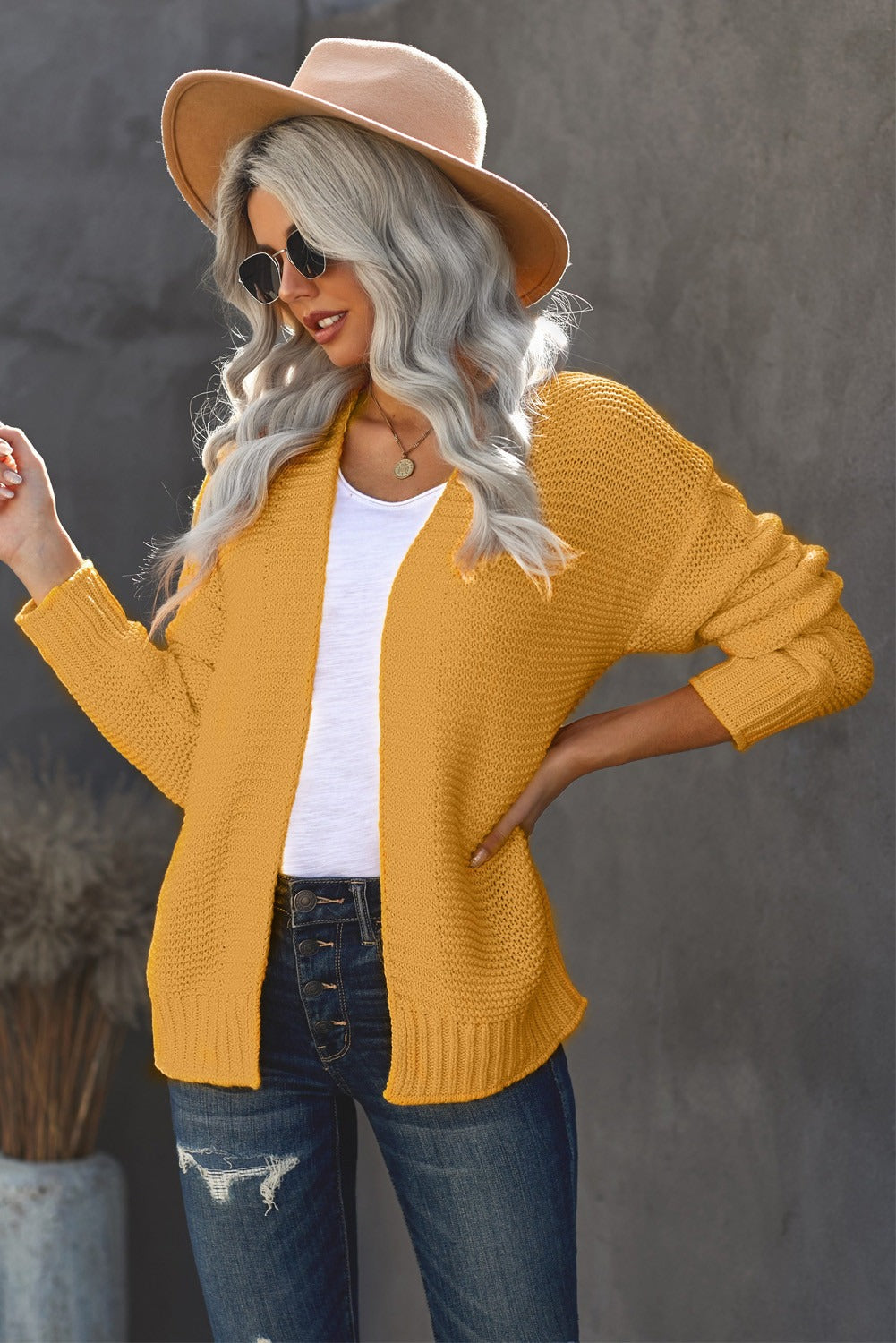 A stylish Women's Yellow Open Front Chunky Knit Cardigan featuring a slouchy fit and braided texture on sleeves, perfect for winter wear.